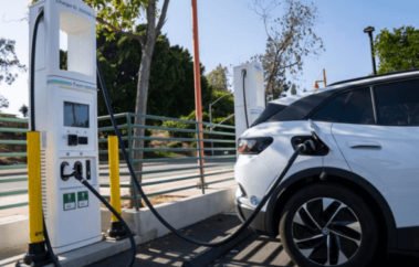 Charging of the white Electric Car Charging of the white Electric Car